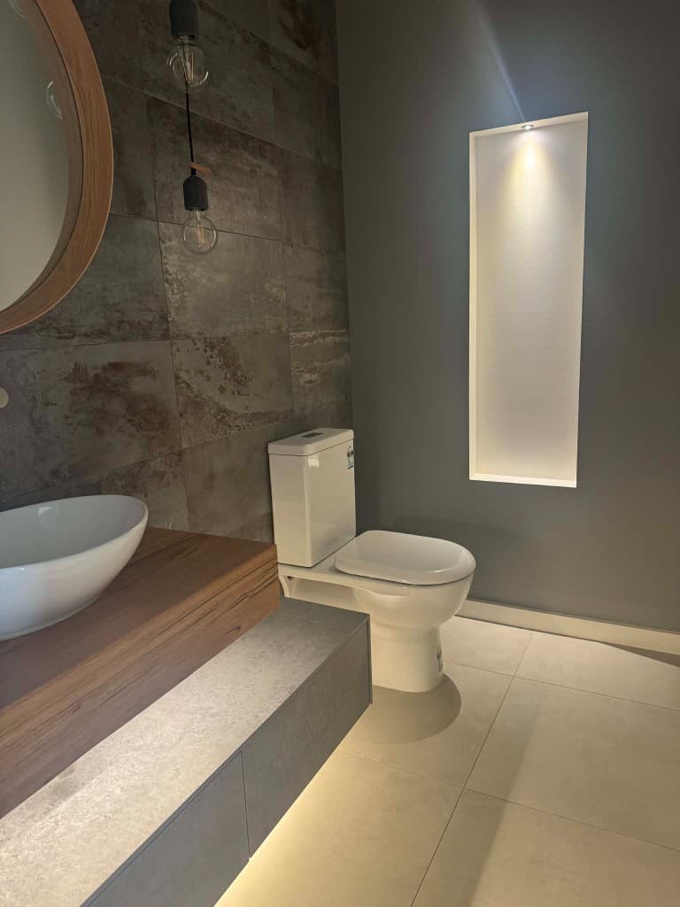 Ceiling downlights installed in a tiled bathroom